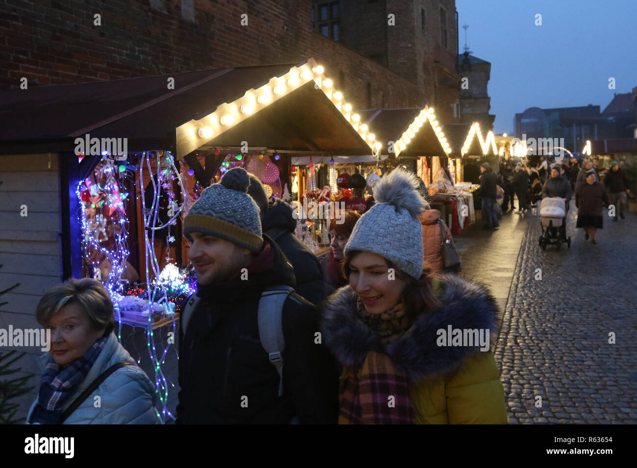 Gdansk, Poland 3rd. December 2018 Christmas fair in the old city centre is  seen Poland People visit the Christmas market to buy Christmas presents,  eat regional food and feel the atmosphere of