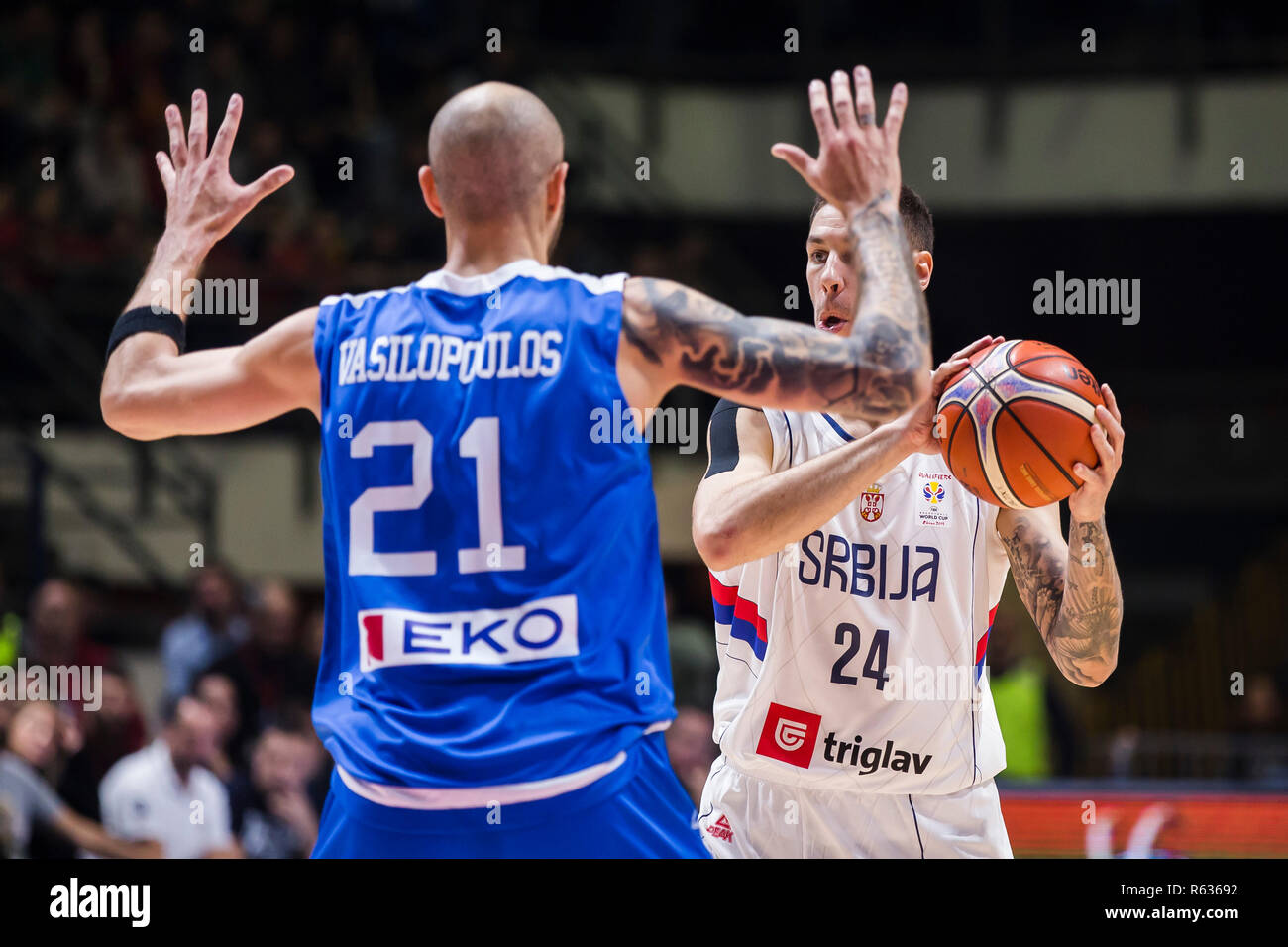 Belgrade, Serbia. 3rd Dec, 2018. FIBA Basketball World Cup 2019 Qualifiers:  Serbia v Greece, Belgrade. Stefan Jovic of Serbia looks for the high pass  forward while Panagiotis Vasilopoulos of Greece blocks him