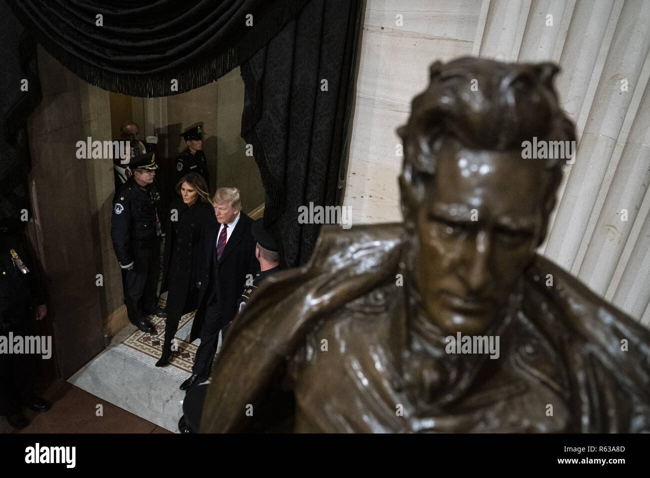 Washington, District of Columbia, USA. 3rd Dec, 2018. WASHINGTON, DC - DECEMBER 3 : President Donald J. Trump and first lady Melania Trump walk by a statue of former President Andrew Jackson as they arrive to pay their respects to former president George H.W. Bush as he lies in State at the U.S. Capitol Rotunda on Capitol Hill on Monday, Dec. 03, 2018 in Washington, DC. (Photo by Jabin Botsford/Pool) Credit: Jabin Botsford/CNP/ZUMA Wire/Alamy Live News Stock Photo