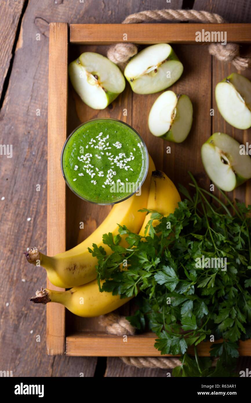 healthy breakfast parsley, apple and banana smoothies. raw foods and