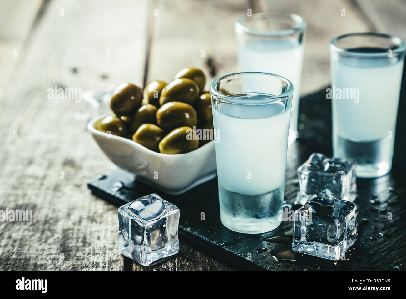 Traditional greek vodka ouzo in shot glasses Stock Photo Alamy