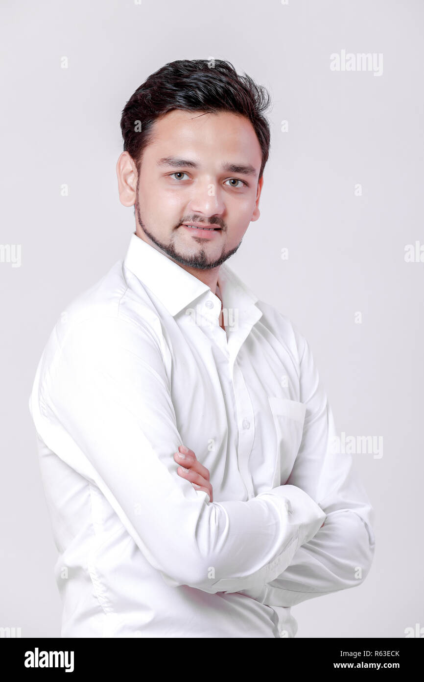 young indian man Standing isolated over white background Stock Photo ...