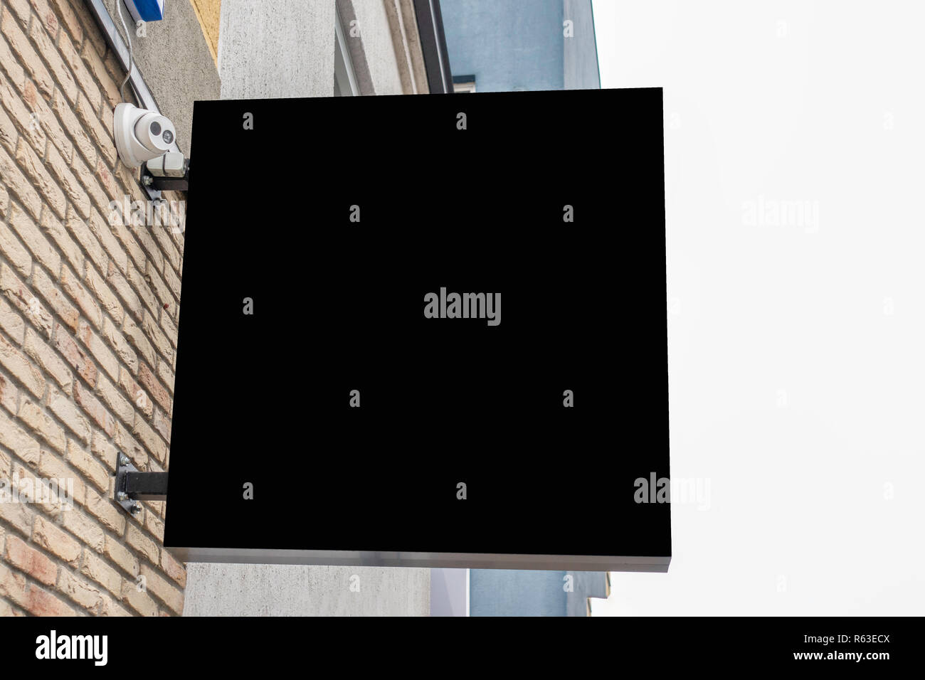 Mock up of blank black rectangular signboard on the wall Stock Photo ...