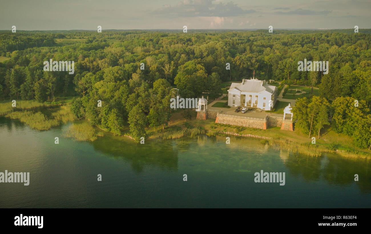 Drone photography of Uzutrakis manor during sunset Stock Photo - Alamy