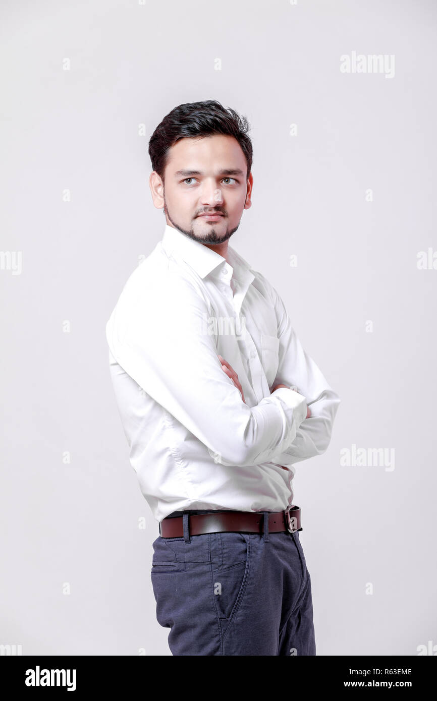 young indian man Standing isolated over white background Stock Photo