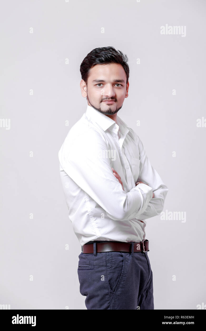 young indian man Standing isolated over white background Stock Photo