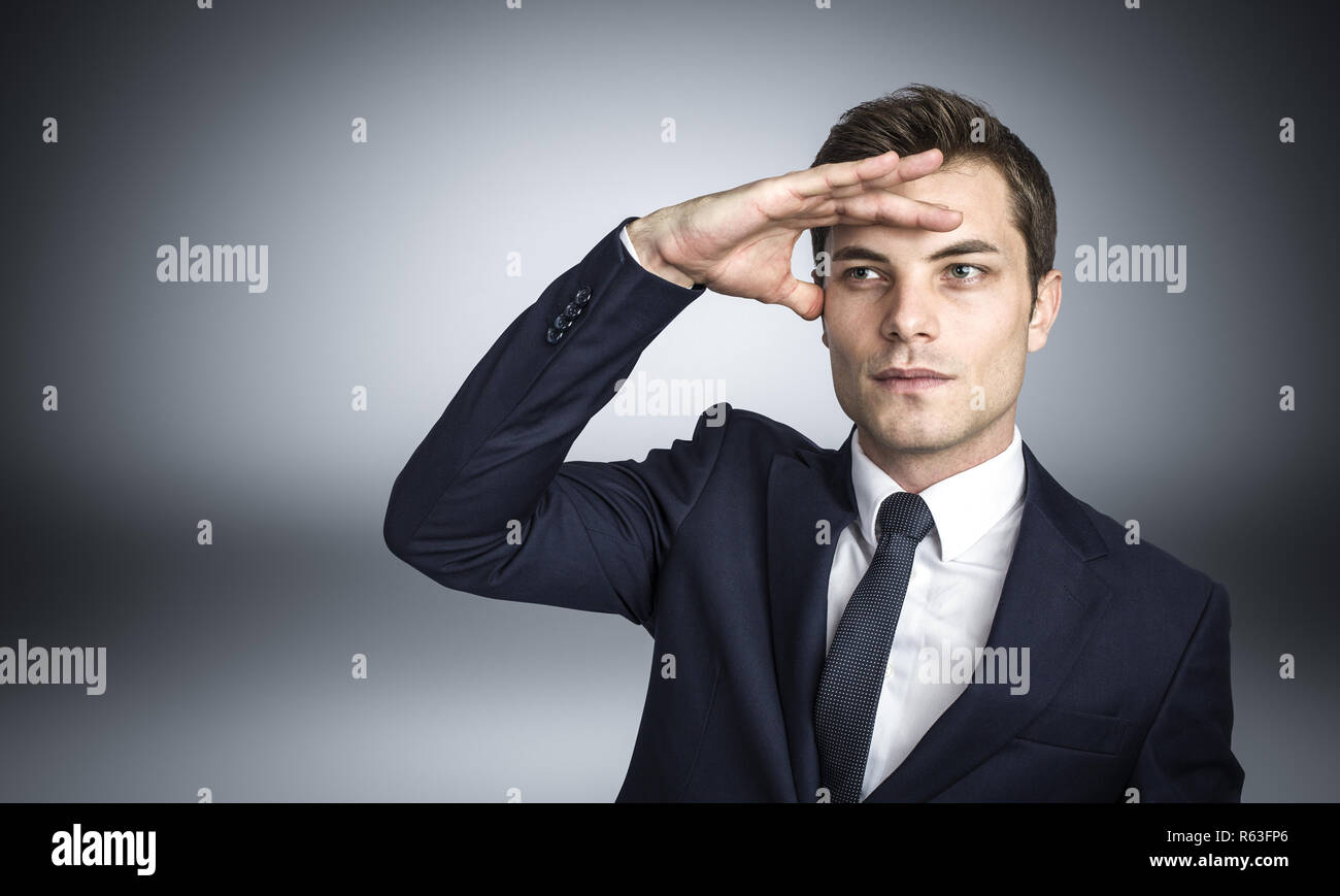 young caucasian businessman in looking pose studio shot Stock Photo
