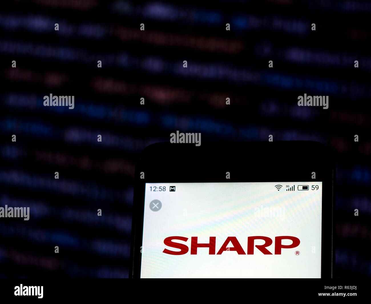 Sharp Corporation logo seen displayed on smart phone. Stock Photo