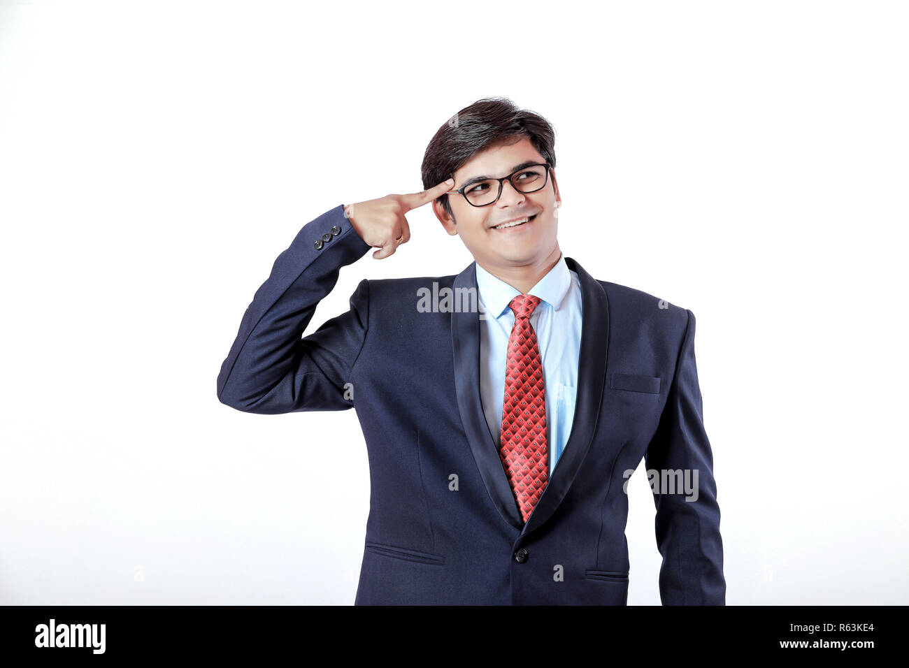 Young Indian businessman over white background Stock Photo
