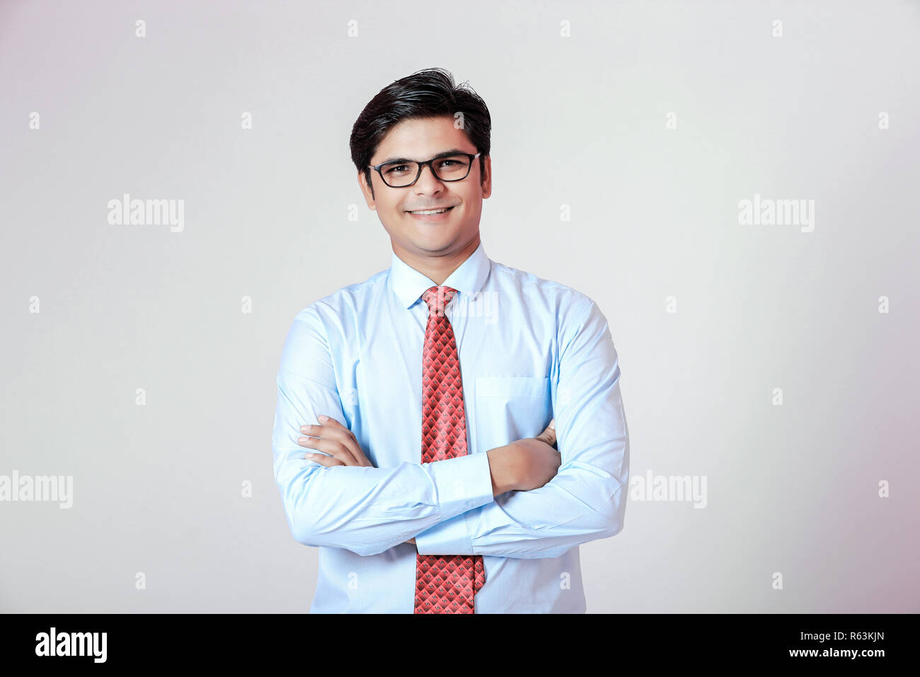 Young Indian businessman over white background Stock Photo