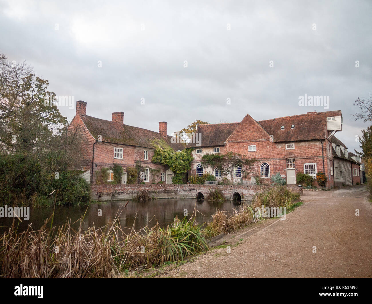flatford mill building old historical red brick constable country country mill house estate Stock Photo
