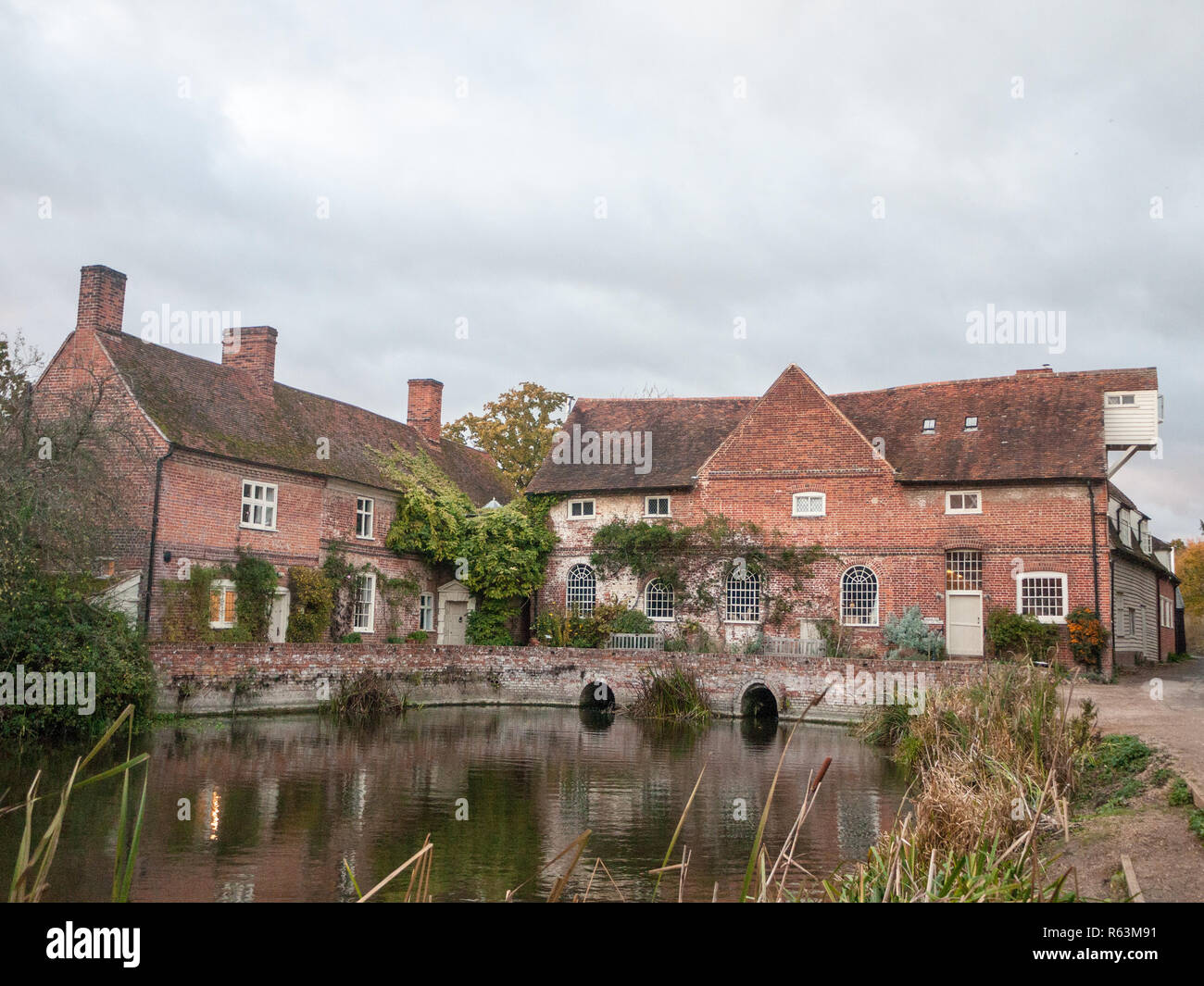 flatford mill building old historical red brick constable country country mill house estate Stock Photo