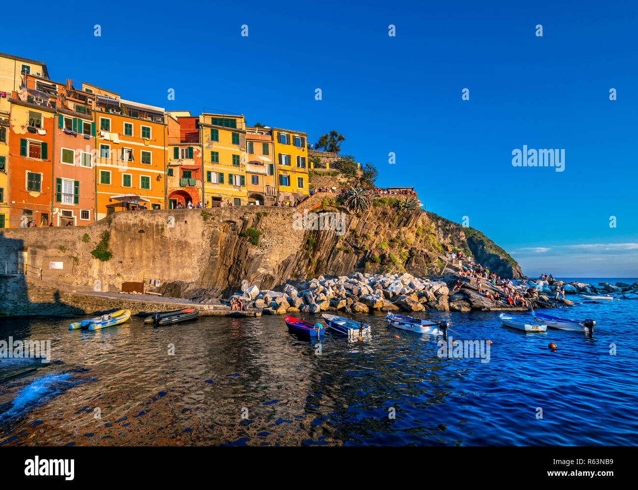 Town view with harbor and colorful houses, Riomaggiore, Cinque Terre, La Spezia, Liguria, Italy, Europe Stock Photo