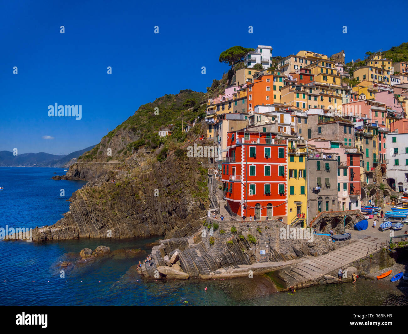 Town view with harbor and colorful houses, Riomaggiore, Cinque Terre, La Spezia, Liguria, Italy, Europe Stock Photo