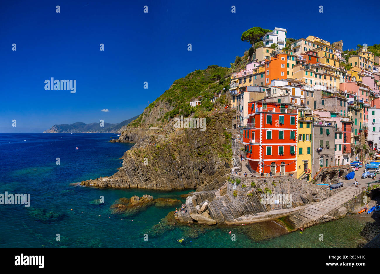 Town view with harbor and colorful houses, Riomaggiore, Cinque Terre, La Spezia, Liguria, Italy, Europe Stock Photo