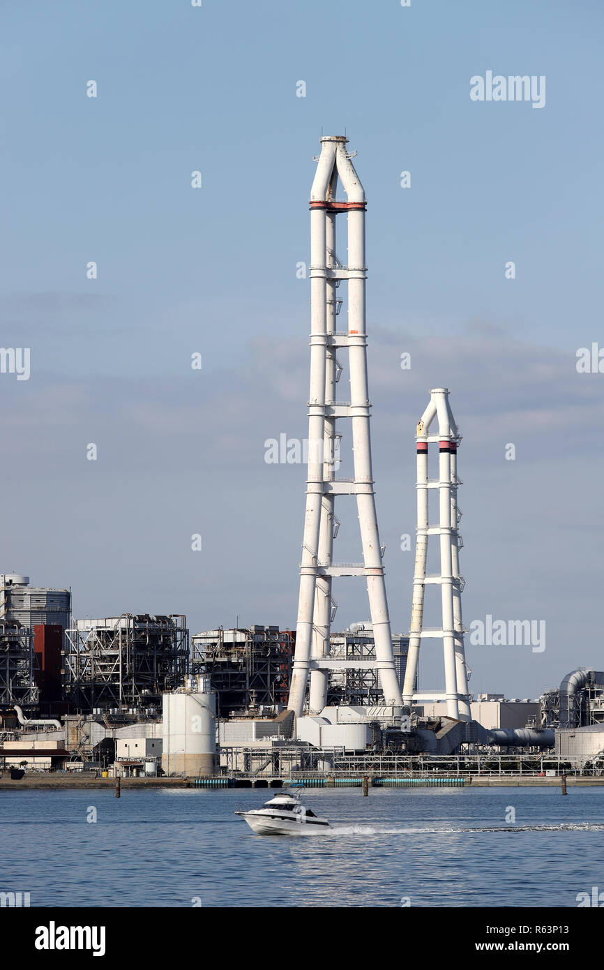 smoke stack on a blue sky background Stock Photo - Alamy