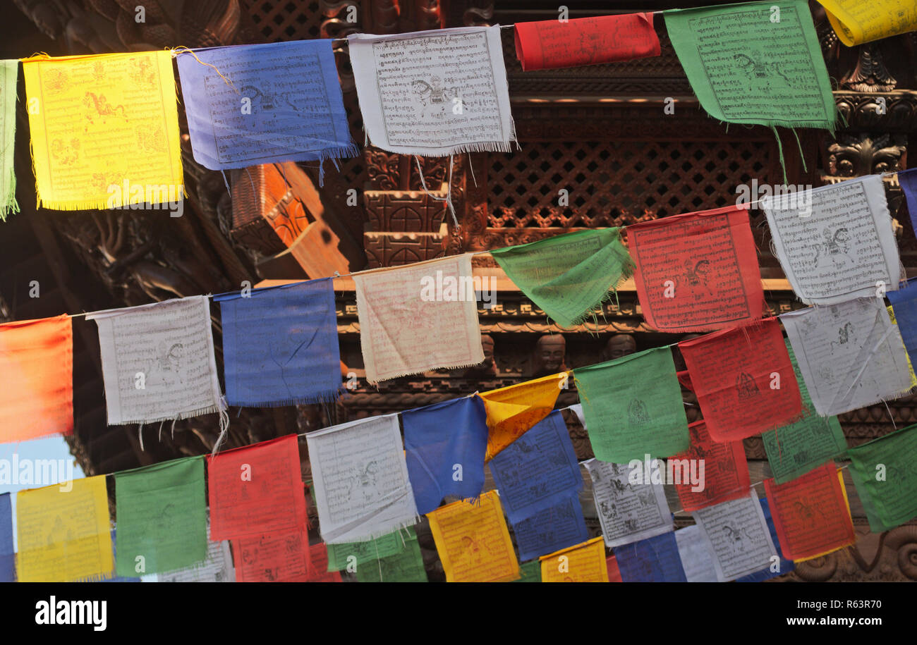 Tibetan prayer flags with text Stock Photo - Alamy
