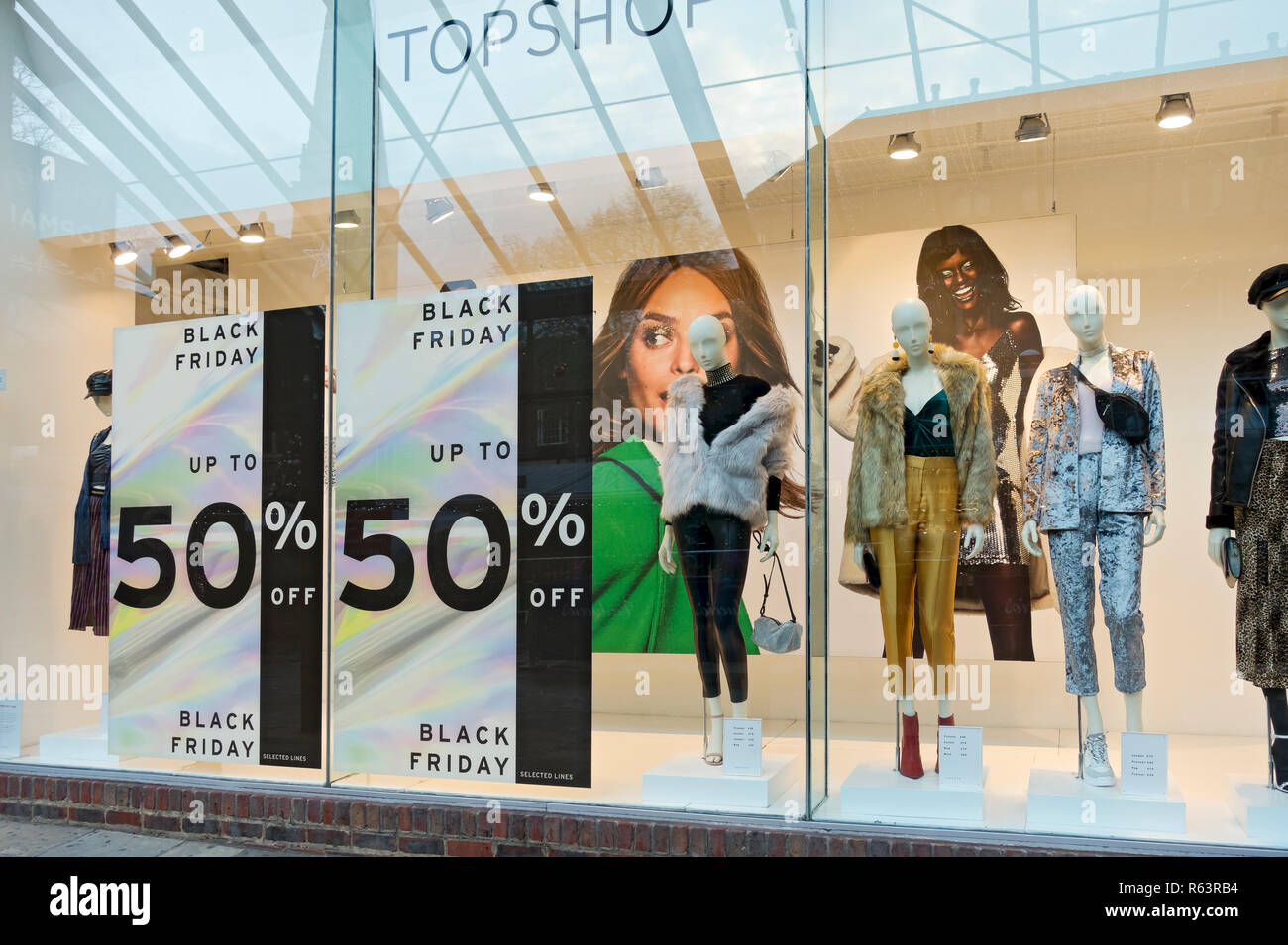 Black Friday signs sign on Topshop fashion clothes clothing retail retailer  shop store window England UK United Kingdom GB Great Britain Stock Photo -  Alamy