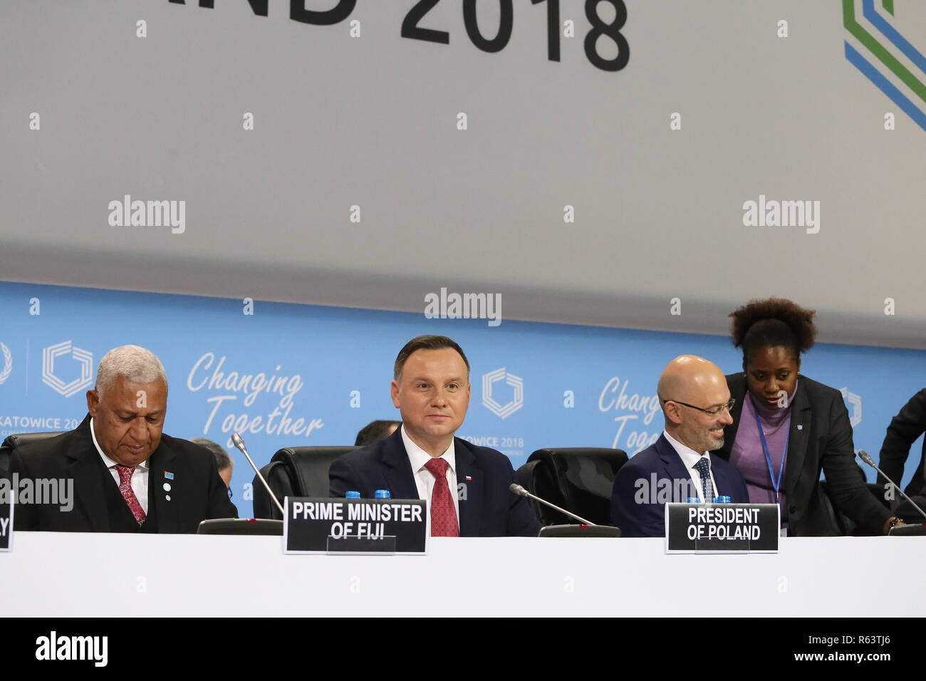 L-R Frank Bainimarama, Prime Minister of Fiji, Andrzej Duda, President of Poland, and Michal Kurtyka, President of COP 24 conference, are seen during Stock Photo