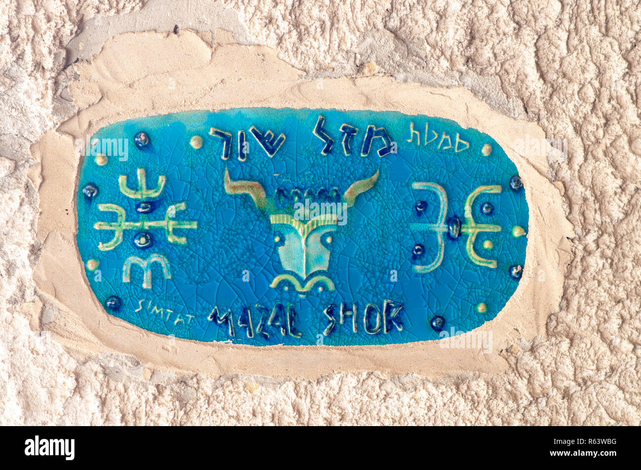 Israel, Jaffa, Ceramic Taurus Zodiac street sign Stock Photo