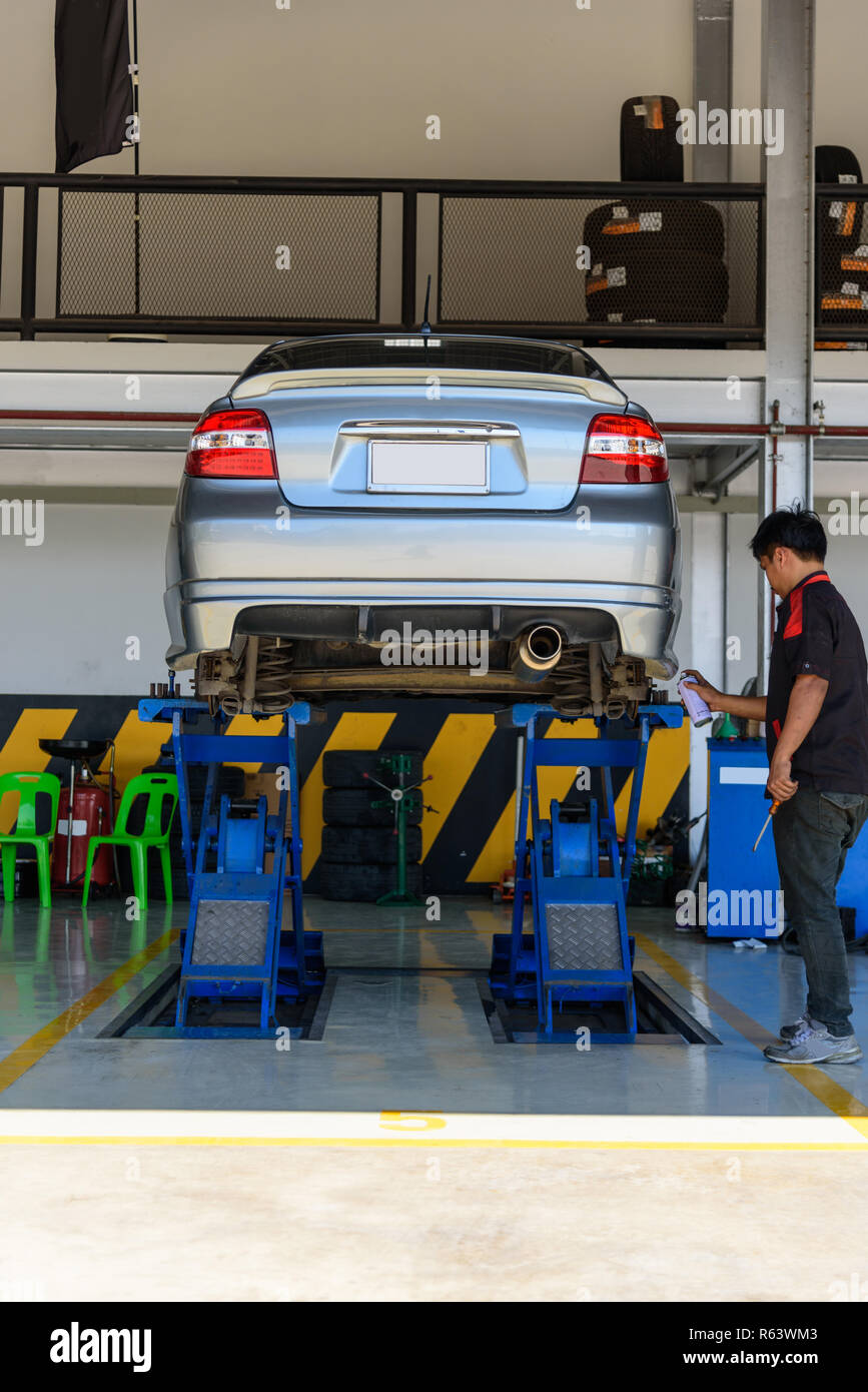 Lift the car for Suspension Check for maintenance Stock Photo Alamy