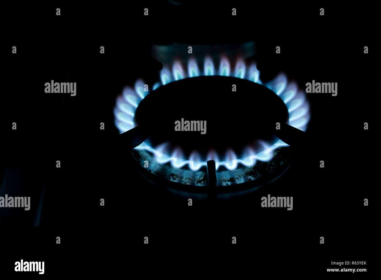 Blue flames on a gas hob Stock Photo Alamy