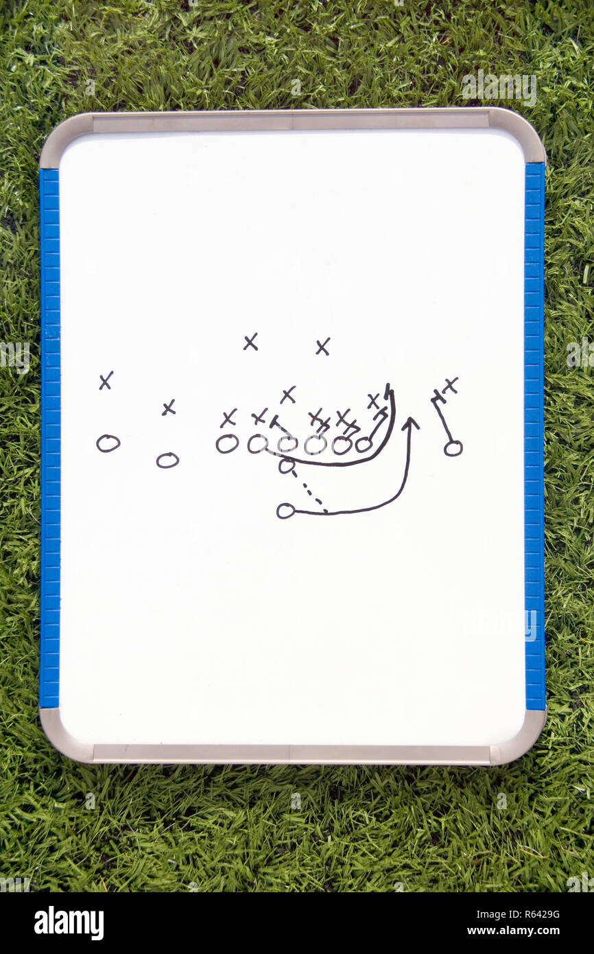 Football Clipboard with Play Diagram Stock Photo - Alamy