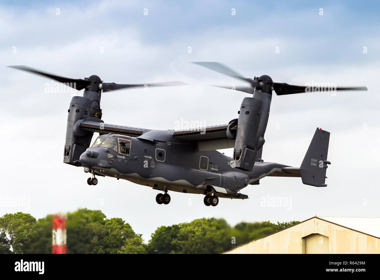 USMC Bell Boeing V-22 Osprey is an American multi-mission, tiltrotor military aircraft with both vertical takeoff and landing (VTOL), and short takeof Stock Photo
