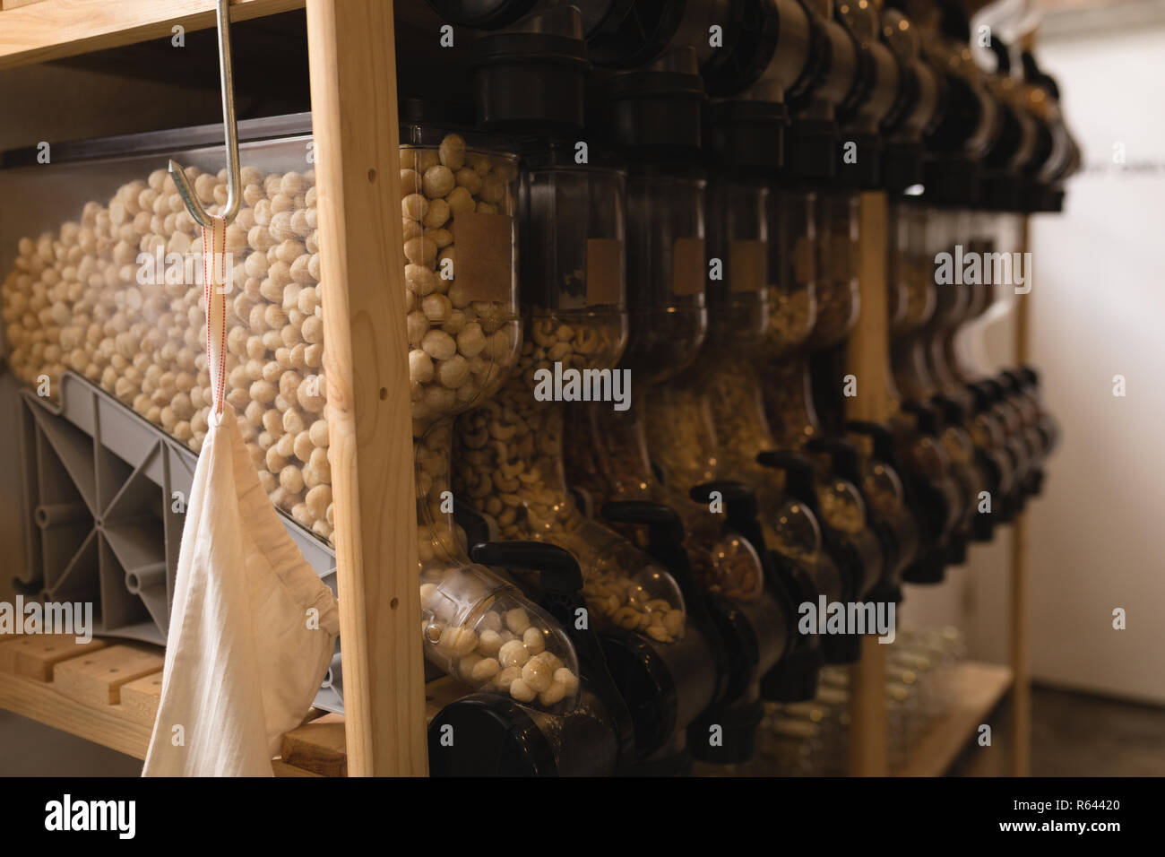 Cereals in dispenser at supermarket Stock Photo Alamy