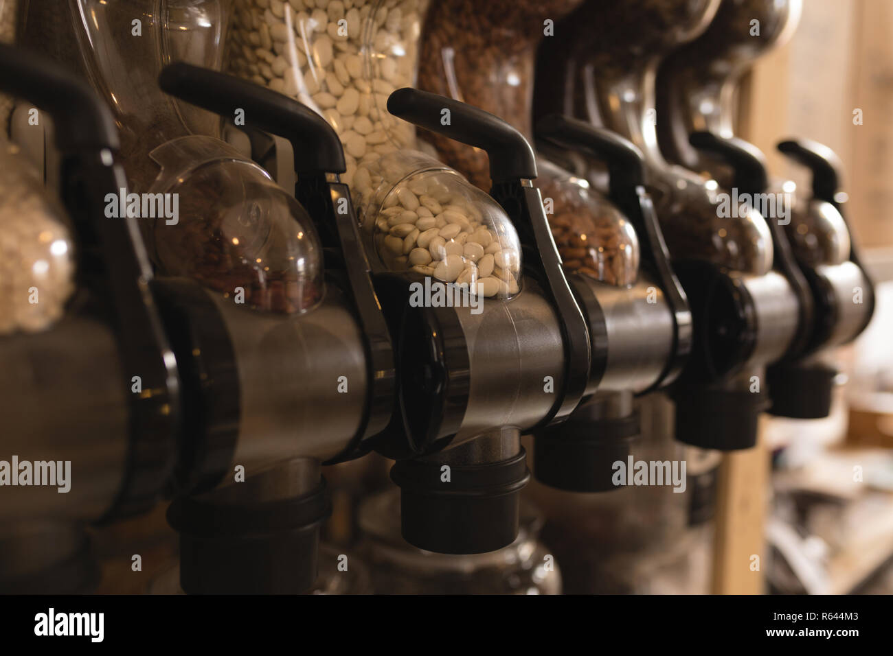 Cereals in dispenser at supermarket Stock Photo Alamy