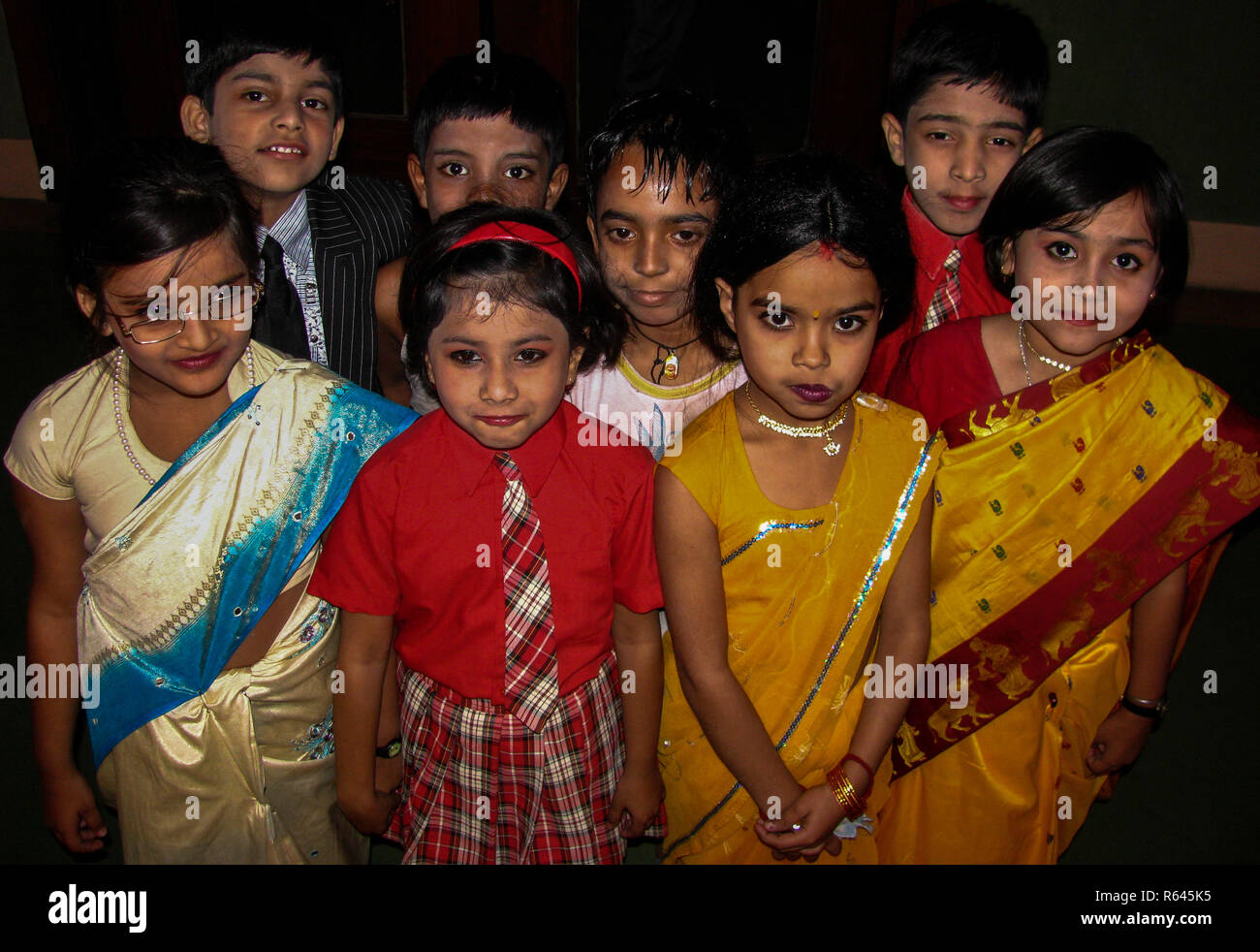 Young kids like dressing up, this is a photo of group of Indian school ...
