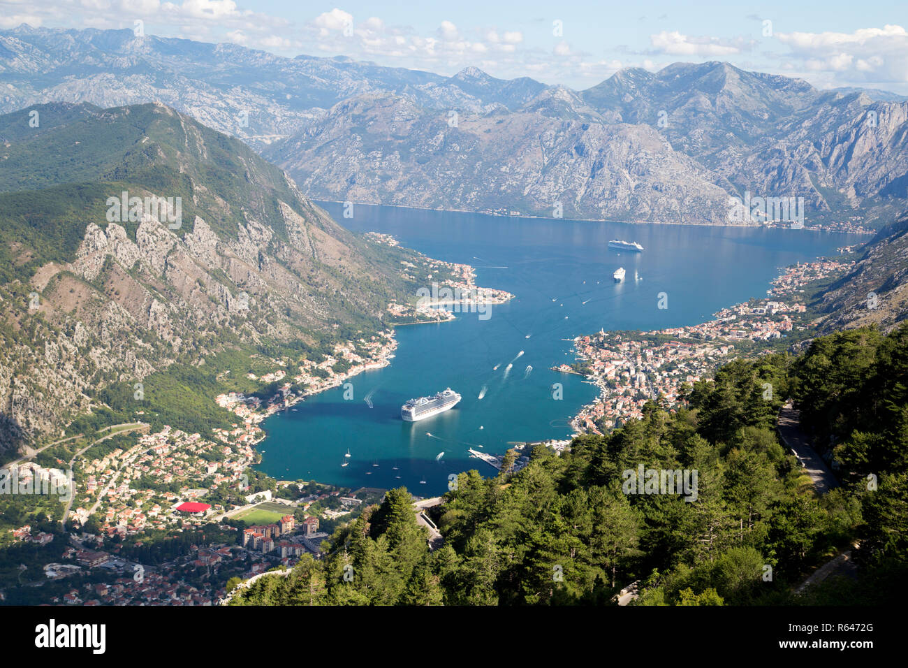 Kotor bay view from above with crouise boat. Stock Photo