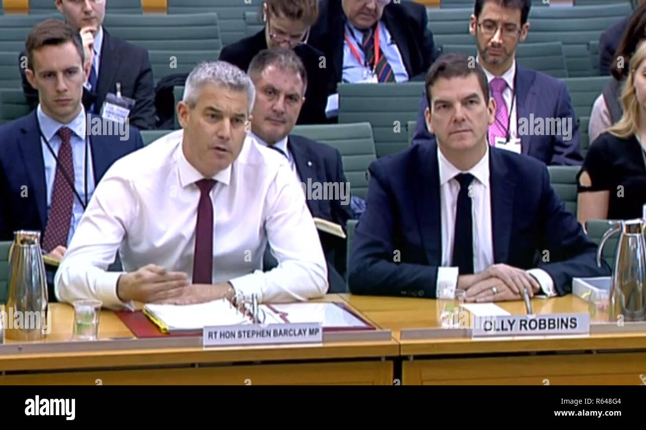 Brexit Secretary Stephen Barclay (left) and The Prime Minister's Europe Adviser Oliver Robbins give evidence before the Exiting the European Union Committee on the progress of the UK's negotiations on EU withdrawal at Portcullis House, London. Stock Photo