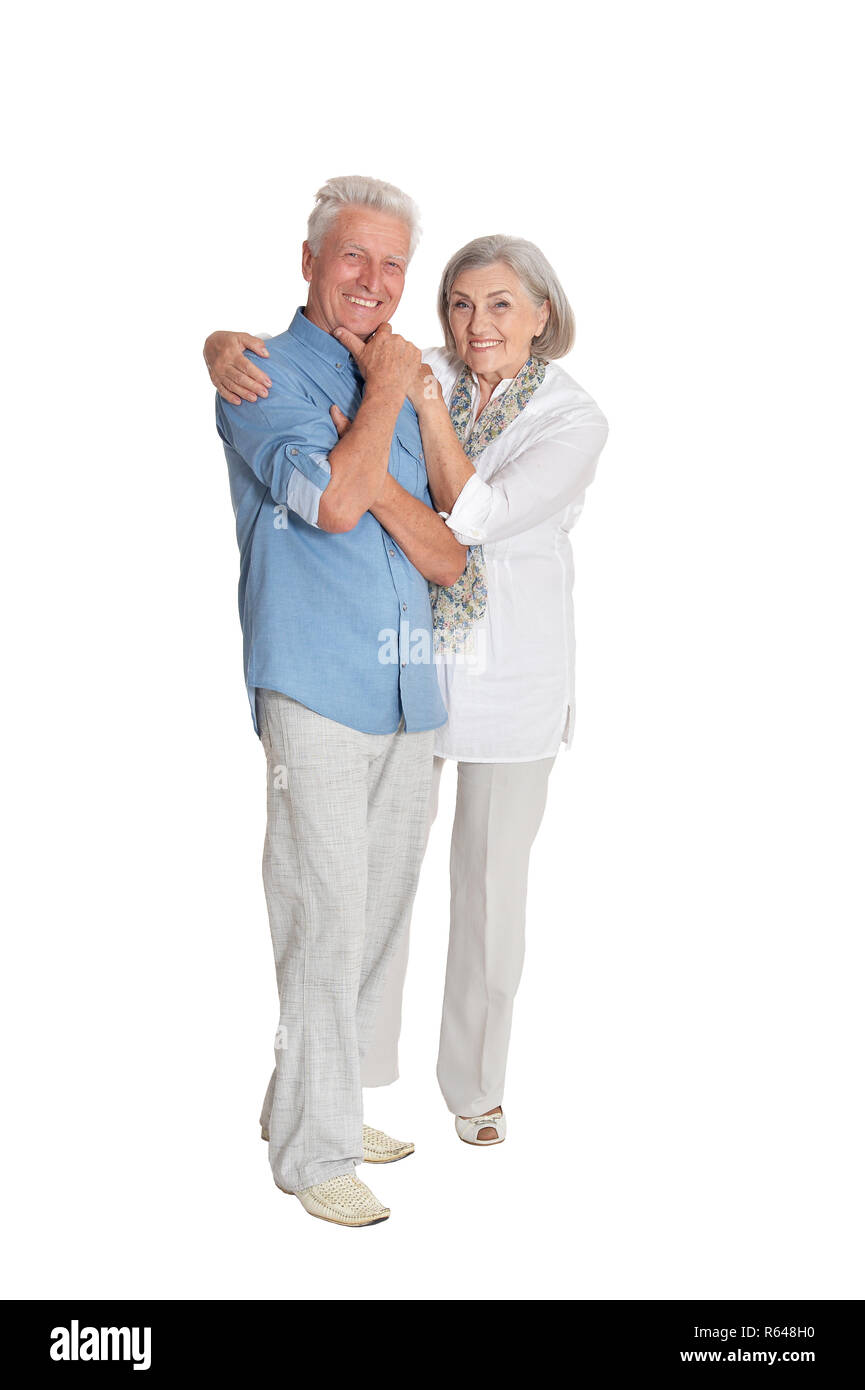 Happy senior couple posing isolated on white background Stock Photo