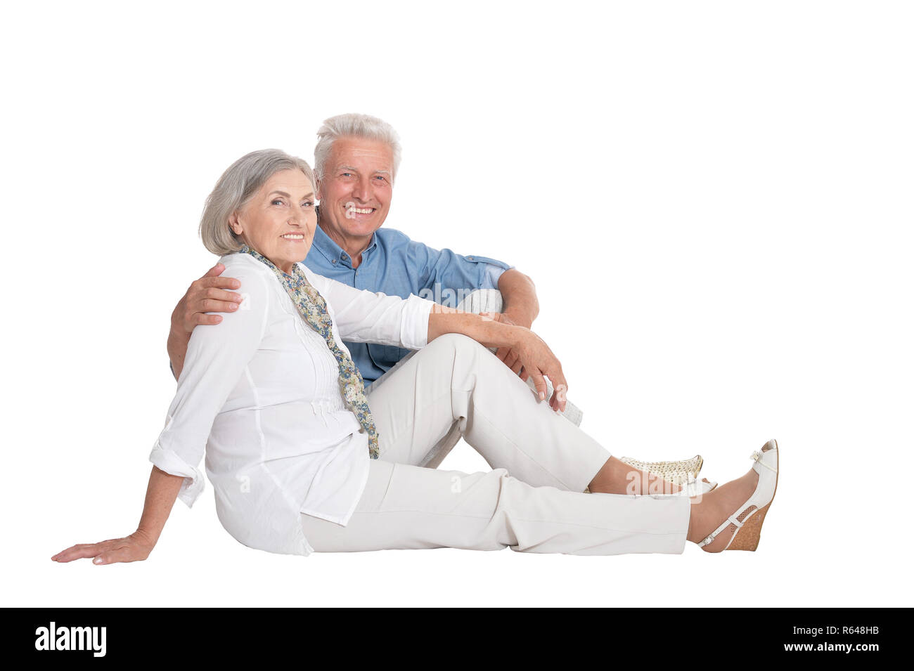 Happy senior couple posing isolated on white background Stock Photo - Alamy
