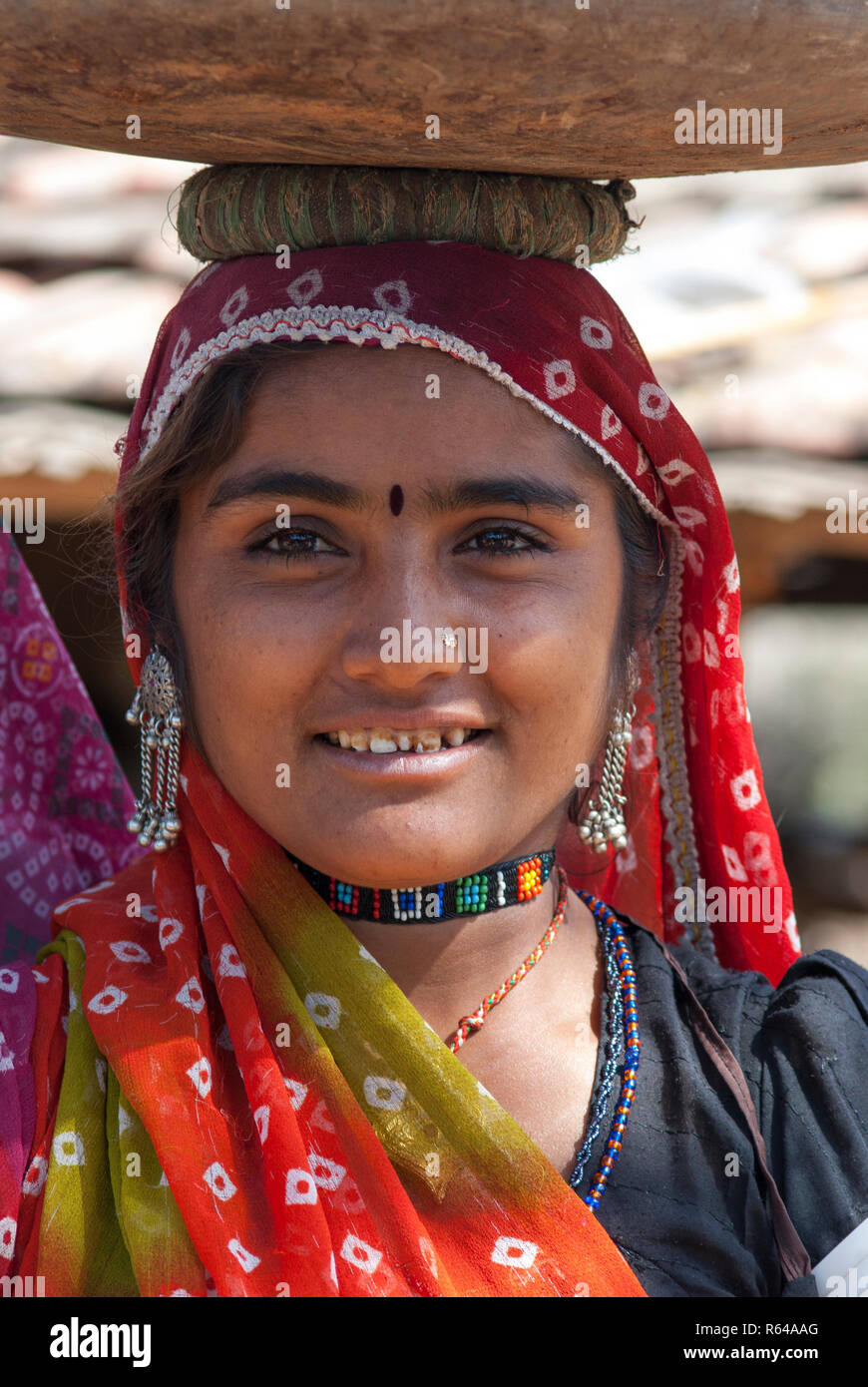 Rabari woman with head basket Stock Photo