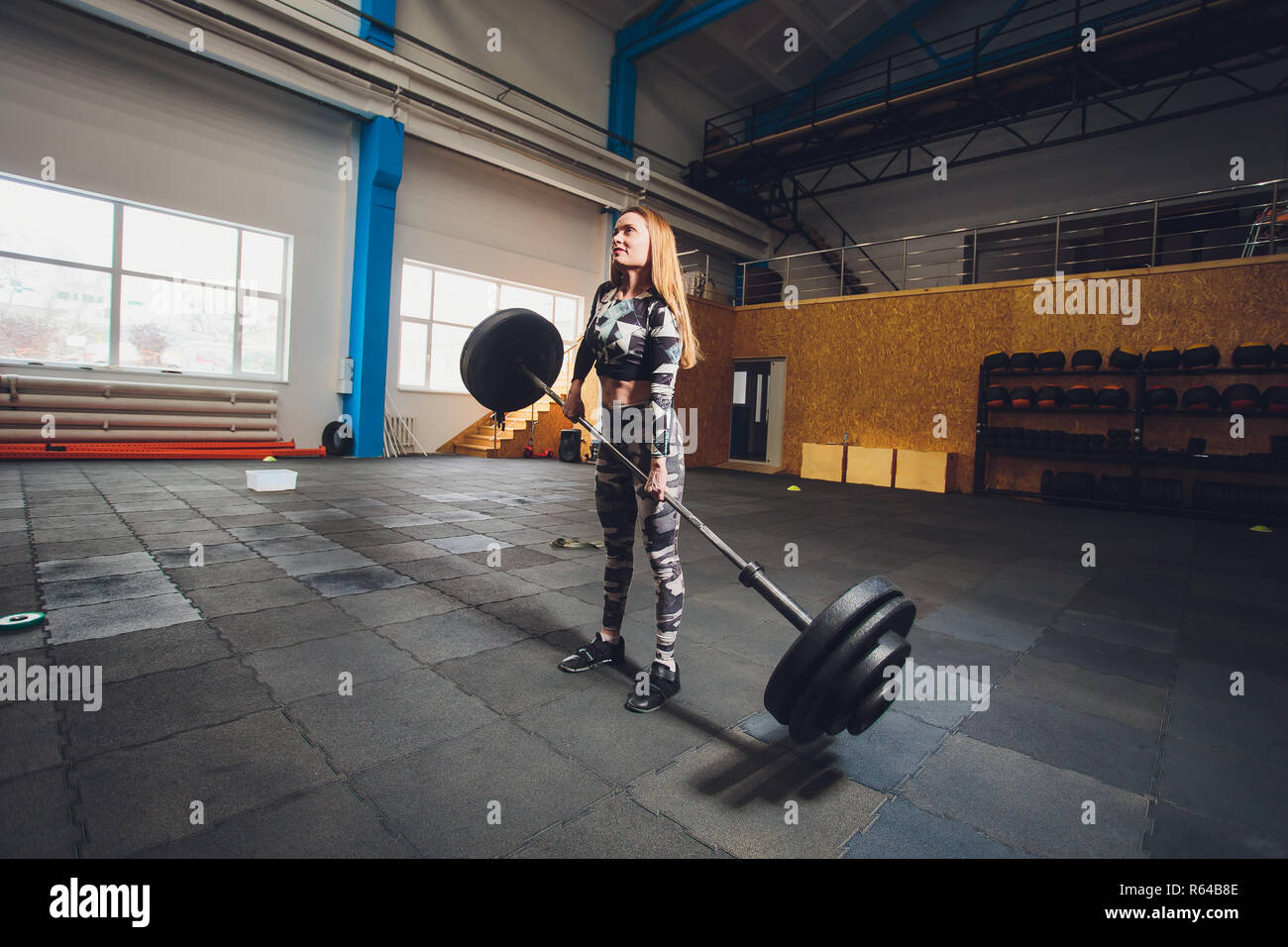 Attractive Young Sports Woman With Barbell Deadlift Dropped The