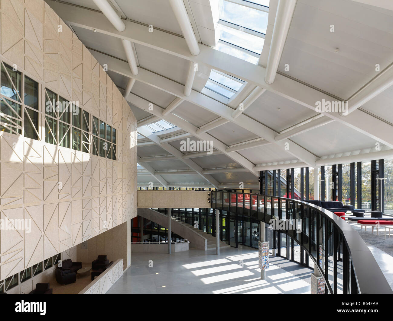 Elevated view across main entrance hall with mezzanine seating. Auditorium  Carnal Hall at Le Rosey, Rolle, Switzerland. Architect: Bernard Tschumi, 20  Stock Photo - Alamy