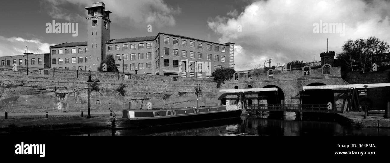 The Grocers Warehouse Ruins and Bridgewater Canal, Castlefield, Manchester, Lancashire, England, UK Stock Photo