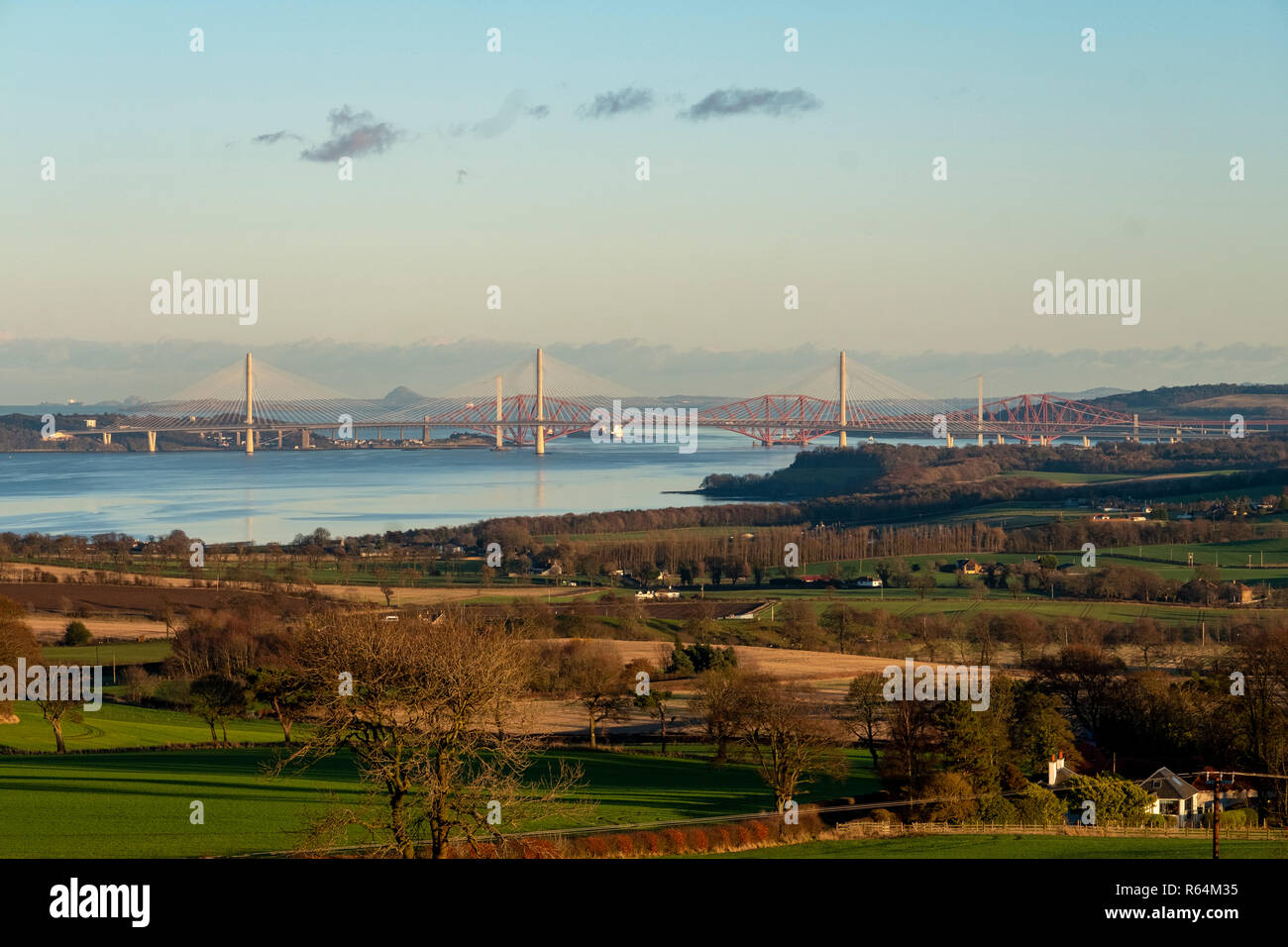 Three bridges, the Queensferry Crossing, Forth Road bridge, and Forth Rail Bridge spanning the Firth of Forth between North and South Queensferry. Stock Photo