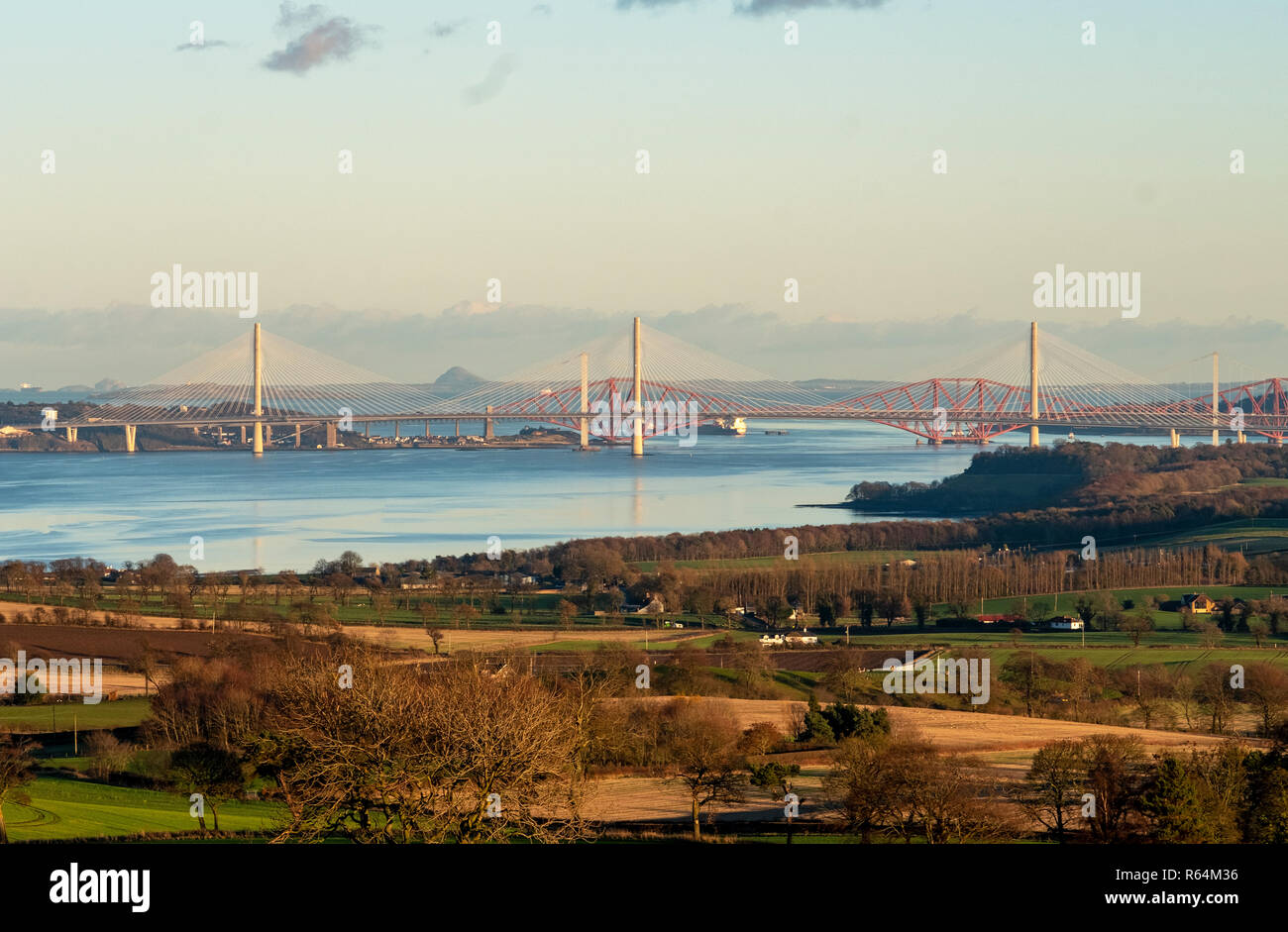 Three bridges, the Queensferry Crossing, Forth Road bridge, and Forth Rail Bridge spanning the Firth of Forth between North and South Queensferry. Stock Photo