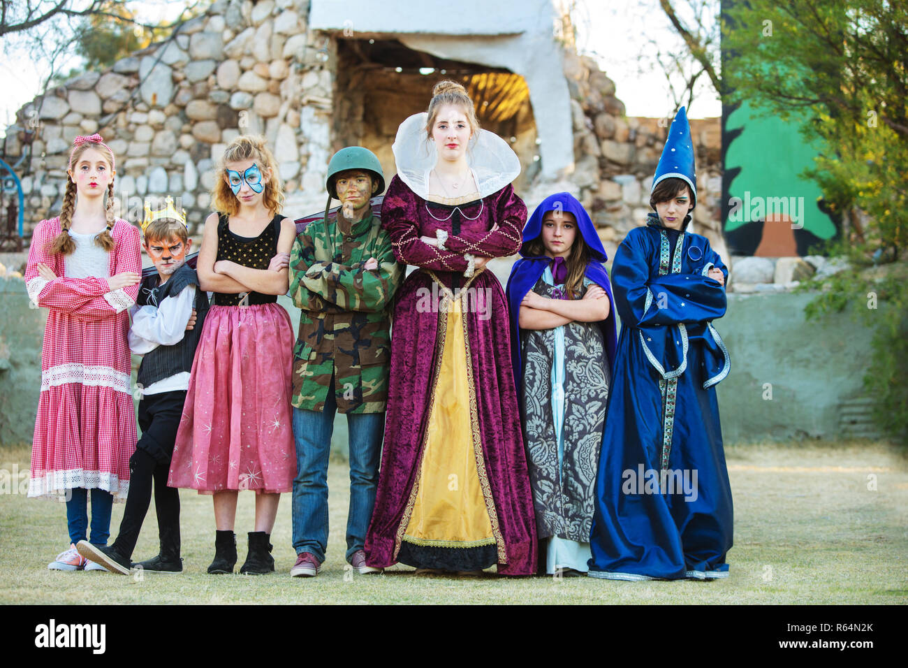 Serious young actors in costume Stock Photo