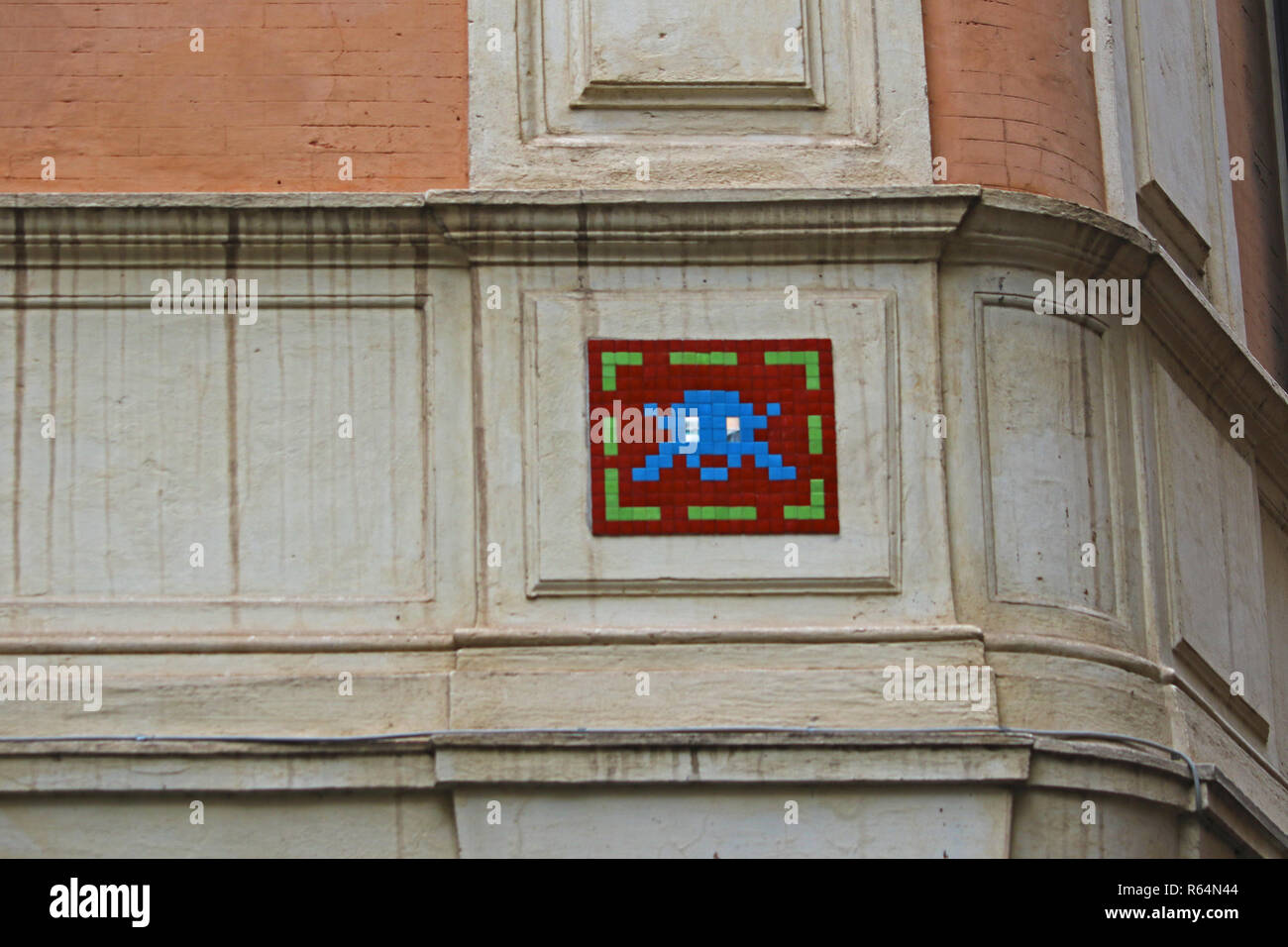 Invader or space invader art street mosaic near the Fratte church in Rome, Italy near Piazza di Spagna by the French urban artist known as Invader Stock Photo