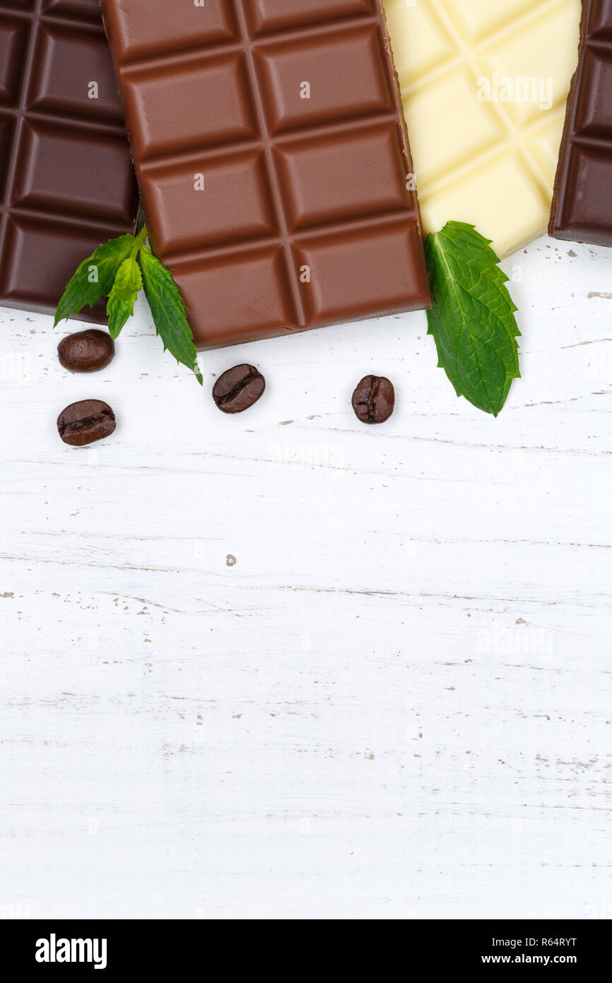 chocolate chalkboard candy food copy space vertical format wooden board