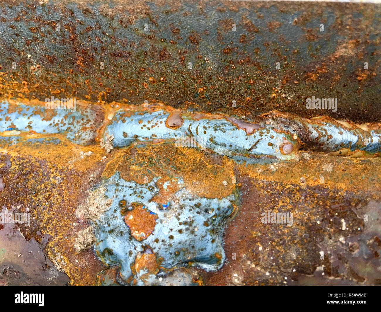 rusty metal with a weld Stock Photo Alamy