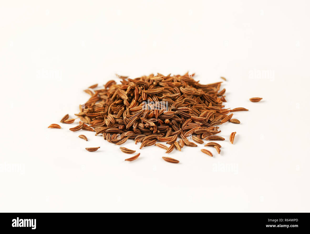 pile of caraway seeds Stock Photo Alamy