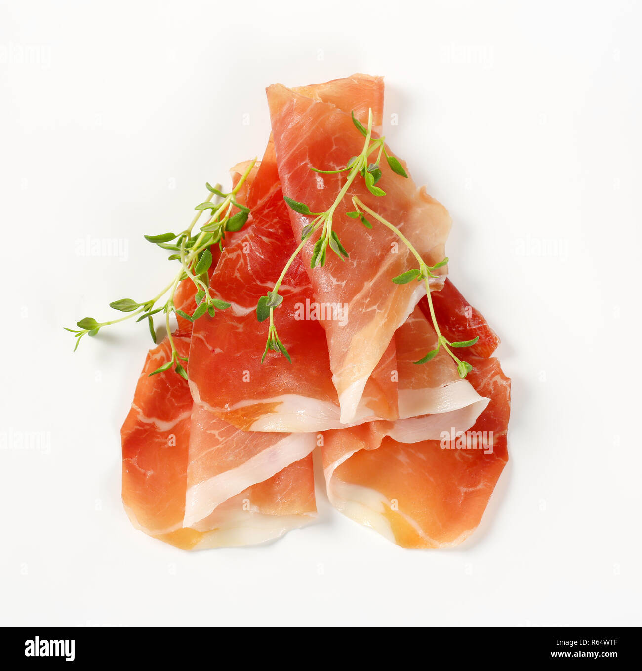 air dried ham with thyme Stock Photo Alamy