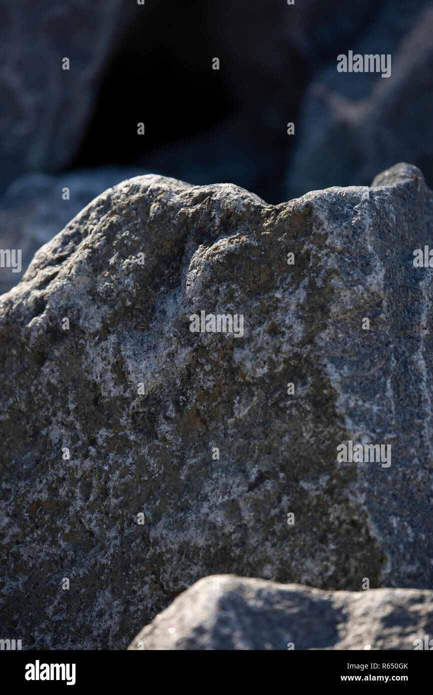 Close up of large, sparkly grey granite rocks Stock Photo - Alamy