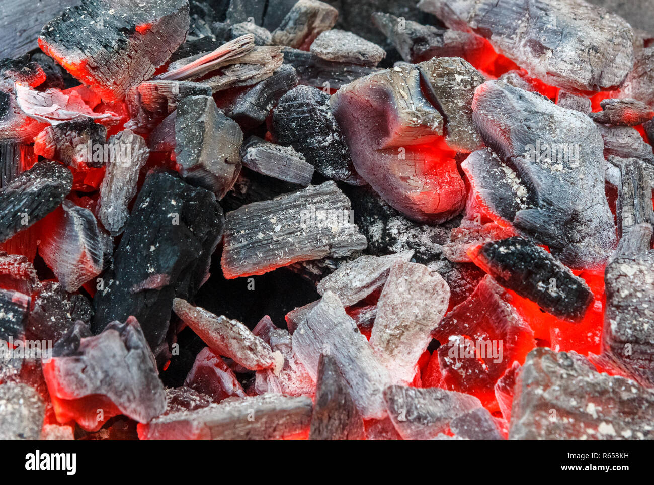 Charcoal glowing red in a grill Stock Photo