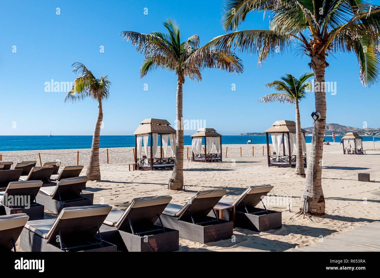 White sand beach with lounges and cabanas at Hyatt Ziva Los Cabos, an all inclusive resort at San Jose del Cabo, Mexico. Stock Photo